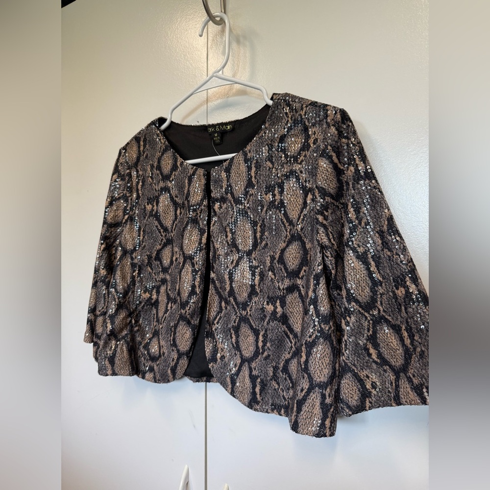 New park and main sequined swing coat in snakeskin pattern.  Costume.  Fall.